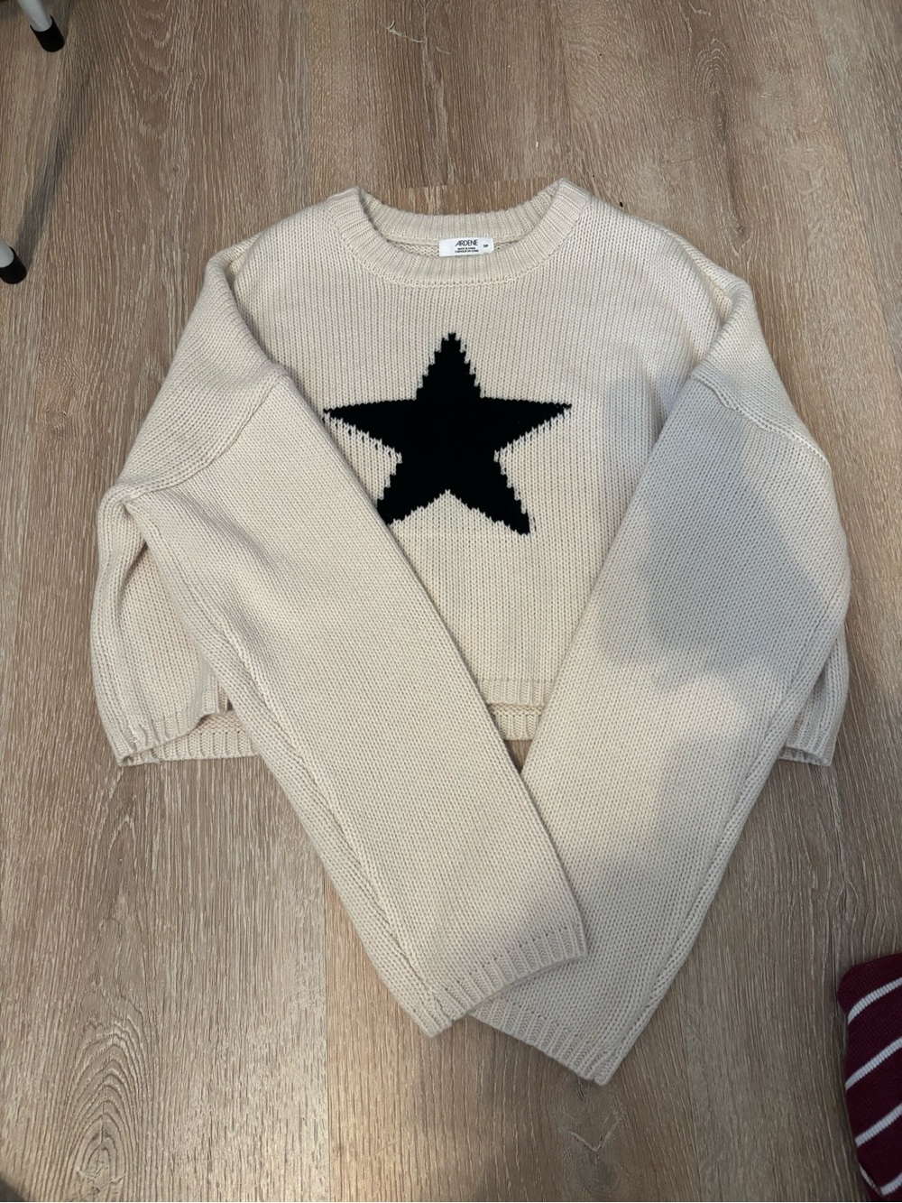 Ardene Cream Sweater with Black Star